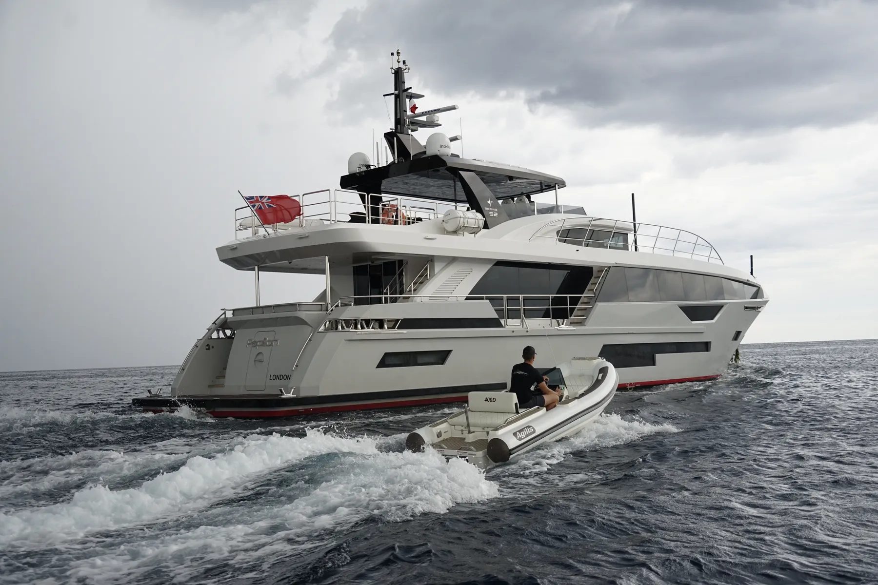 Agilis 400D jet tender under way alongside its 28-metre mothership